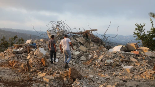Palestinians inspect the home of terrorist Muhammad Dar Yusuf in Kobar, Samaria, which the IDF demolished on Aug. 28, 2018. Dar Yusuf murdered 31-year-old Yotam Ovadia in the town of Adam. Credit: Flash90.