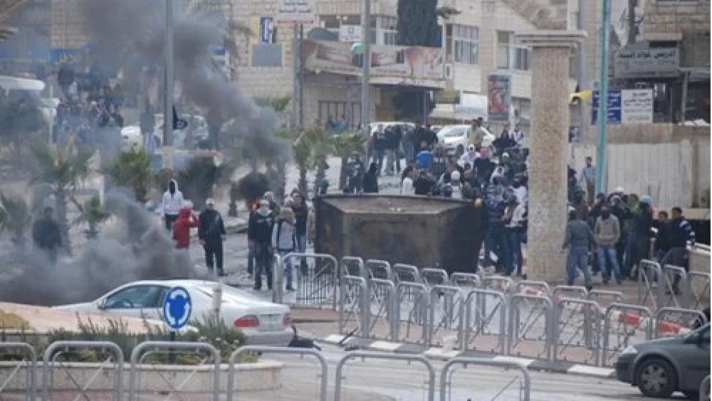 Palestinians riot in Al-Ram, northeast of Jerusalem, Oct. 12, 2022. Credit: IDF.