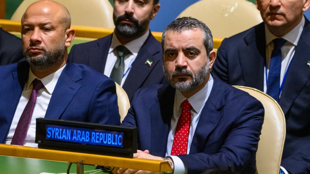 The Minister of Foreign Affairs and Expatriates of Syria, Asaad Hassan al-Shaibani, listens to the President of Syria Ahmad Al-Sharaa speaks during the 81st session of the United Nations (U.N.) General Assembly at U.N. Headquarters on Sept. 23, 2026 in New York City. Photo by Alexi J. Rosenfeld/Getty Images.