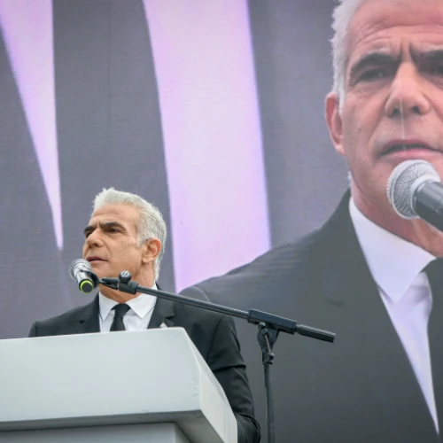 Opposition leader Yair Lapid speaks at a protest outside the Knesset in Jerusalem against the government's judicial reform plan, Feb. 13, 2023. Photo by Arie Leib Abrams/Flash90.
