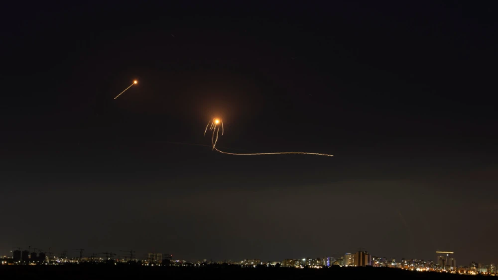 A long-exposure picture showing Israel's Iron Dome air-defense system intercepting rockets fired from the Gaza Strip, as seen from Ashkelon, May 14, 2021. Photo by Avi Roccah/Flash90.