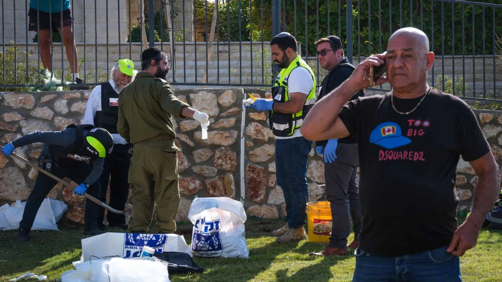 Israeli security and rescue forces at the scene where a man was killed by a Hezbollah rocket fired from Lebanon, in northern Israeli city of Nahariya, Nov. 21, 2024. Photo by Fadi Amun/Flash90.