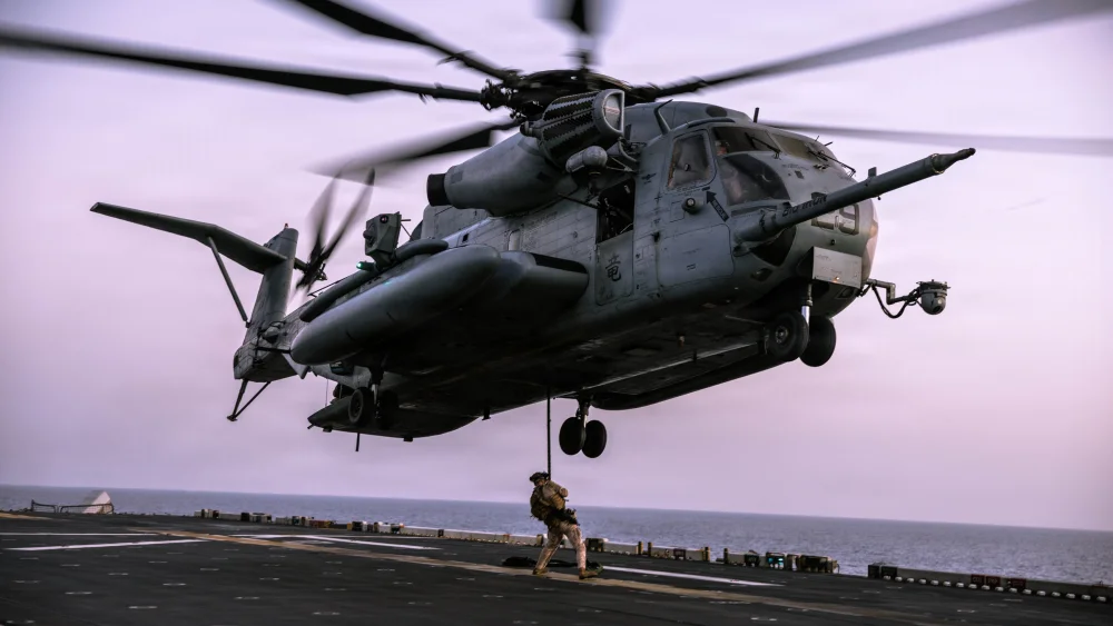 U.S. Marines with the Maritime Raid Force, 31st Marine Expeditionary Unit, conduct fast-rope training aboard the USS Tripoli in the Arabian Sea, in this image released by U.S. Central Command on June 2, 2026. Source: @CENTCOM/X.