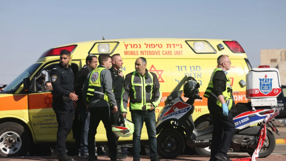 The scene of a deadly terrorist attack, in which an Israeli Arab rammed a car into people near the Ramot neighborhood of Jerusalem, Feb. 10, 2023. Credit: Yonatan Sindel/Flash90.