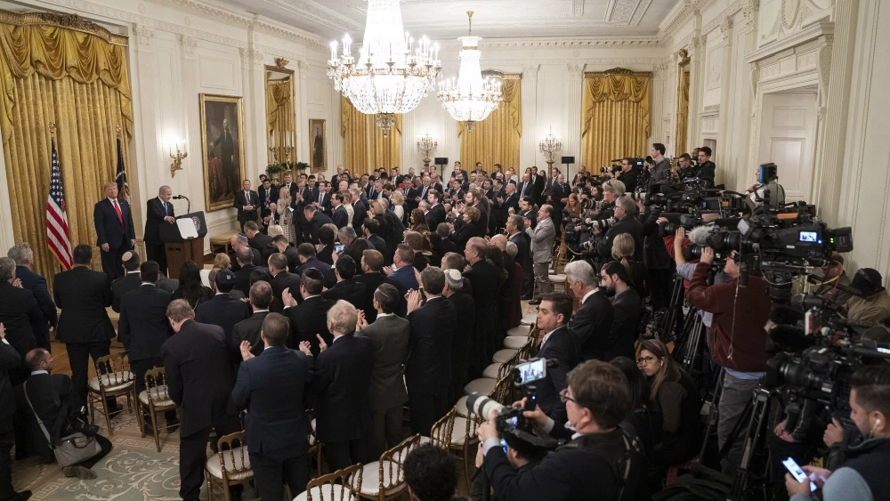 U.S. President Donald Trump listens as Israeli Prime Minister Benjamin Netanyahu delivers remarks on the details of the Trump administration’s Mideast peace plan in the East Room of the White House on Jan. 28, 2020. Official White House Photo by Shealah Craighead.