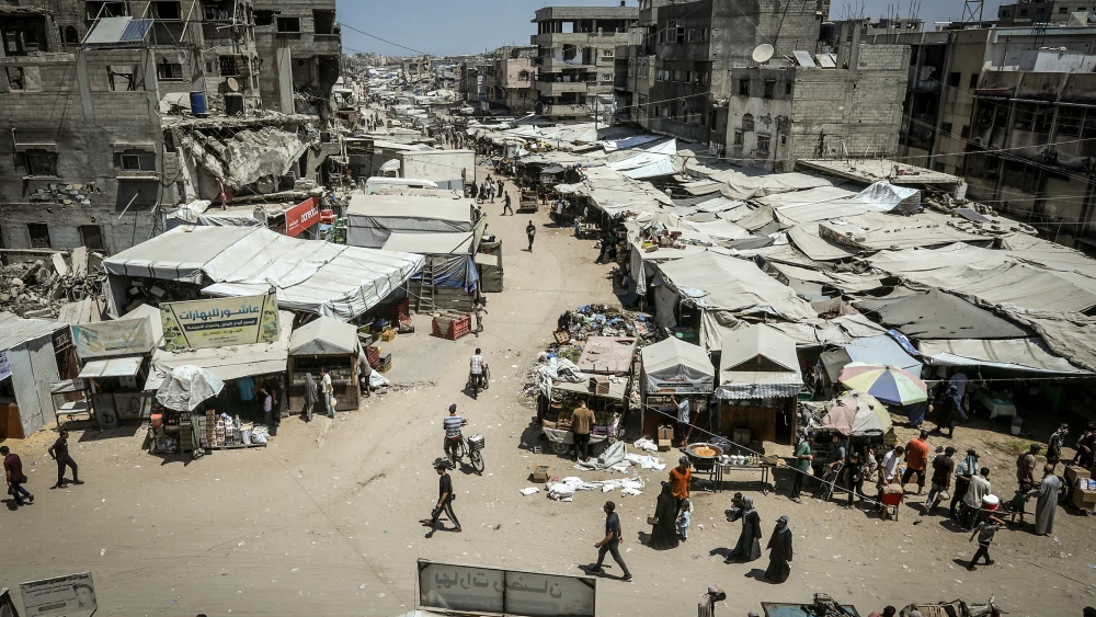 Palestinians are seen in Khan Younis, southern Gaza Strip, on Aug. 12, 2026. Photo by Abed Rahim Khatib/Flash90.