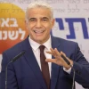 Yesh Atid Party head Yair Lapid speaks during a faction meeting at the Knesset, on July 19, 2021. Photo by Yonatan Sindel/Flash90.