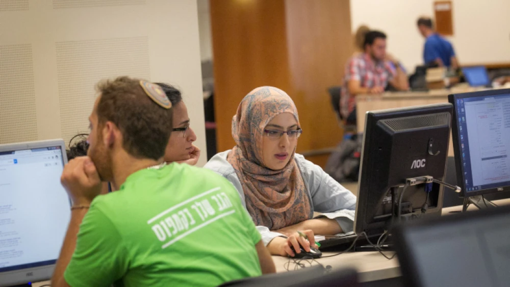 Arab and Jewish students at the Hebrew University's Mount Scopus campus on the first day of the new academic year. Oct. 18, 2015. Photo by Miriam Alster/Flash90.