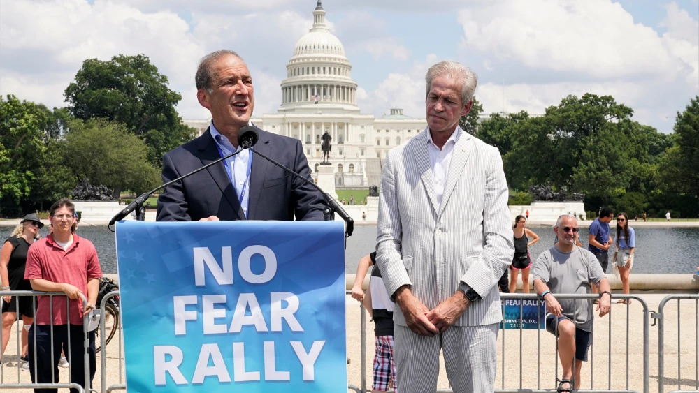 Former Rep. Ron Klein (D-Fla.), chairman of the Jewish Democratic Council of America (JDCA), speaks at the “No Fear: A Rally in Solidarity With the Jewish People” on the National Mall in Washington, D.C., on July 11, 2021. Standing at right is former Sen. Norm Coleman (R-Minn.), chairman of the Republican Jewish Coalition (RJC). Credit: Chris Kleponis.