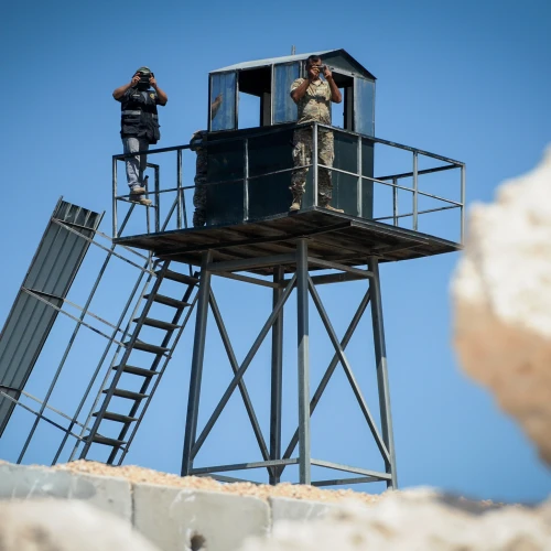 Lebanese soldiers and a member of Hezbollah on the border between Israel and Lebanon on Sept. 5, 2018. Photo by Basel Awidat/Flash90.