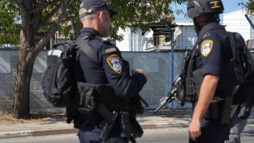 Israel Police officers at a factory in Kiryat Shmona after a Lebanese missile hit there, Aug. 4, 2024. Photo by Ayal Margolin/Flash90.