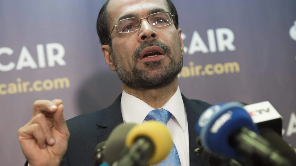 Council on American-Islamic Relations executive director Nihad Awad speaks about a lawsuit CAIR filed against U.S. President Donald Trump and his administration on the ban of travelers from seven countries by Executive Order, during a press conference at CAIR Headquarters in Washington, D.C., Jan. 30, 2017. Photo by Saul Loeb/AFP via Getty Images.