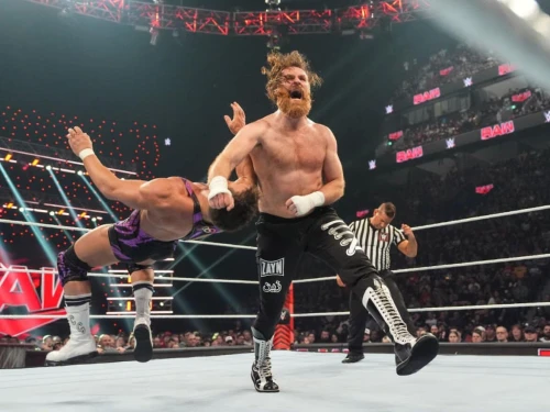 Canadian wrestler Sami Zayn clotheslines Chad Gable during Monday Night RAW at the Bell Centre in Montreal on April 15, 2024. Photo by WWE via Getty Images.