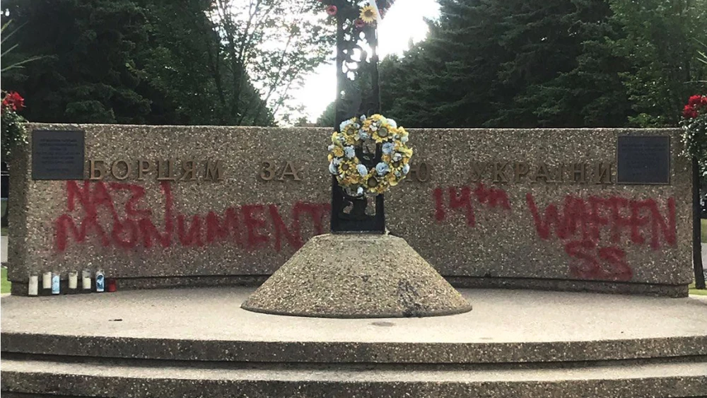 Vandalism on a monument in North Edmonton’s St. Michael’s Cemetery in Canada, dedicated to “freedom fighters,” August 2021. Credit: Friends of Simon Wiesenthal Center in Canada.