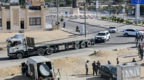 U.N. vehicles and empty trucks wait for the arrival of aid on the Gaza side of the Rafah border crossing with Egypt, Oct. 21, 2023. Photo by Atia Mohammed/Flash90.
