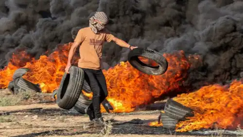 Palestinian protesters gather during a demonstration along the border fence with Israel, east of Gaza City, on Sept. 18, 2023. Photo by Atia Mohammed/Flash90.