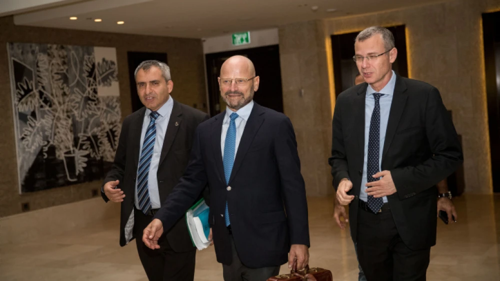 Israeli Jerusalem Affairs Ministers Ze'ev Elkin (left) and Tourism Minister Yariv Levin of the Likud Party (right) walk with Yoram Turbovich of the Blue and White Party as they arrive for a meeting in an attempt to form a coalition, in Jerusalem, Sept. 27, 2019. Photo by Yonatan Sindel/Flash90.