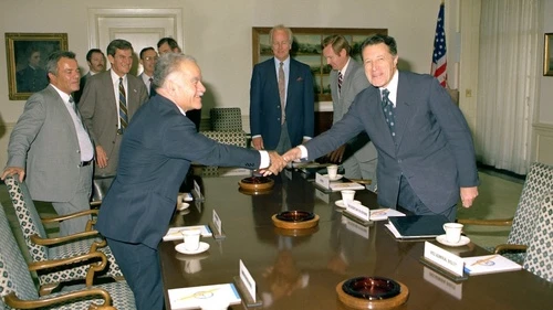 Click photo to download. Caption: U.S. Secretary of Defense Caspar Weinberger (right) greets Israeli Minister of Foreign Affairs Yitzhak Shamir in a Pentagon Conference Room in 1982. In 1983, Shamir rose to prime minister. Credit: Frank Hall.
