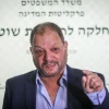 Joint Arab List Knesset member Ofer Cassif arrives at the Israel Police's Internal Investigations Department in Jerusalem, to file a complaint against officers who allegedly attacked him during a protest, April 11, 2021. Photo by Noam Revkin Fenton/Flash90.
