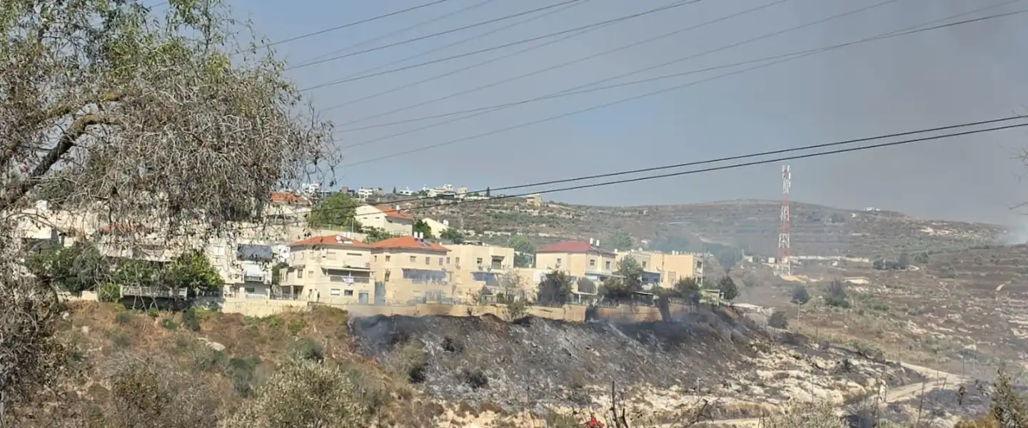 A wildfire burns through the Samaria community of Havat Gilad on July 18, 2026. Credit: Courtesy of the Kedumim Regional Council.