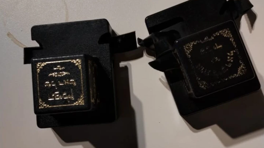 Rabbi Moshe Haliwa's cut tefillin boxes. Courtesy.