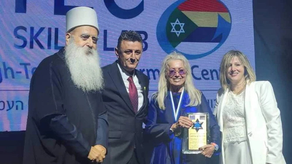 Dr. Miriam Adelson, standing between Koftan and Salha Halabi, receives the Druze Community Honorary Award from spiritual leader Sheikh Mowafaq Tarif at the launch of the Druze Hi-Tech Empowerment Center in Usfiya, near Haifa, on May 5, 2025. Credit: Druze Veterans Association for the Advancement of the Israeli-Druze Soldier.