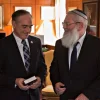 U.S. Secretary of Veterans Affairs David Shulkin (left) and Israeli Deputy Defense Minister Eli Ben-Dahan meet in March. Credit: Gene Russell Photography.