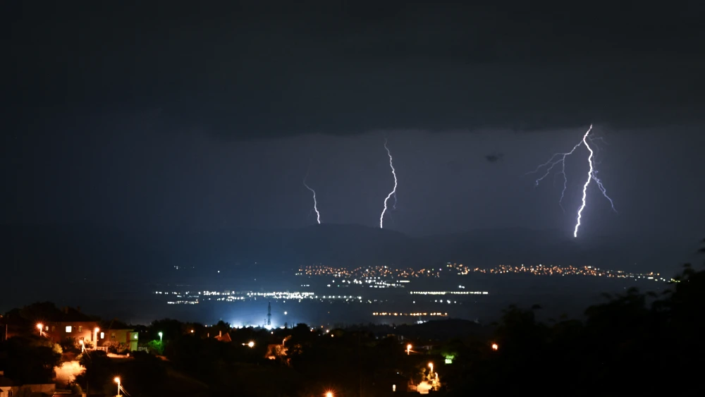 Lighting bolts light up the sky over the Sofia area during a thunderstorm on June 28, 2025. Photo by NIKOLAY DOYCHINOV/AFP via Getty Images.