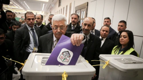 Palestinian Authority leader Mahmoud Abbas casts a vote for members of the Fatah Party's ruling bodies at the P.A. headquarters in the West Bank city of Ramallah on Dec. 3, 2016. Photo by Flash90.