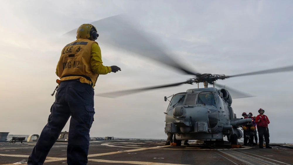 A U.S. Navy MH-60R Sea Hawk helicopter is readied for flight aboard the guided-missile destroyer USS Michael Murphy as the warship supports the U.S. blockade of Iran in regional waters. Credit: United States Central Command.