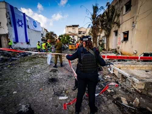 Israeli security and rescue forces at the site where a Hezbollah rocket fired from Lebanon hit homes and cars in the Haifa suburb of Kiryat Bialik, Sept. 22, 2024. Photo by Chaim Goldberg/Flash90.