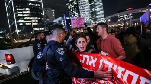 Protesters block the Ayalon Highway in Tel Aviv, calling for the release of Israelis held in Gaza, Jan. 24, 2024. Photo by Chaim Goldberg/Flash90.