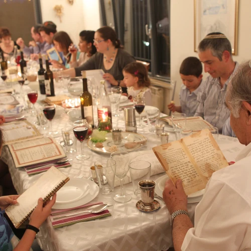 An Israeli family during the Passover seder on the first night of the holiday in Tzur Hadassah. Credit: Nati Shohat/Flash90.