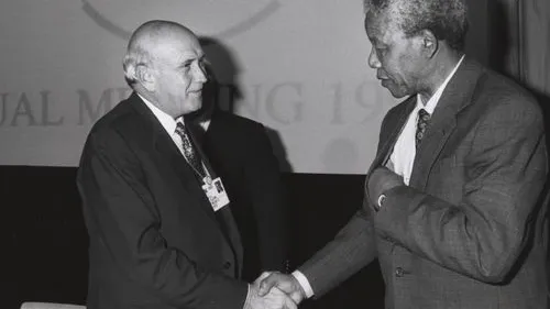 Frederik de Klerk and Nelson Mandela shake hands at the Annual Meeting of the World Economic Forum in Davos, Switzerland, in January 1992. Credit: World Economic Forum.