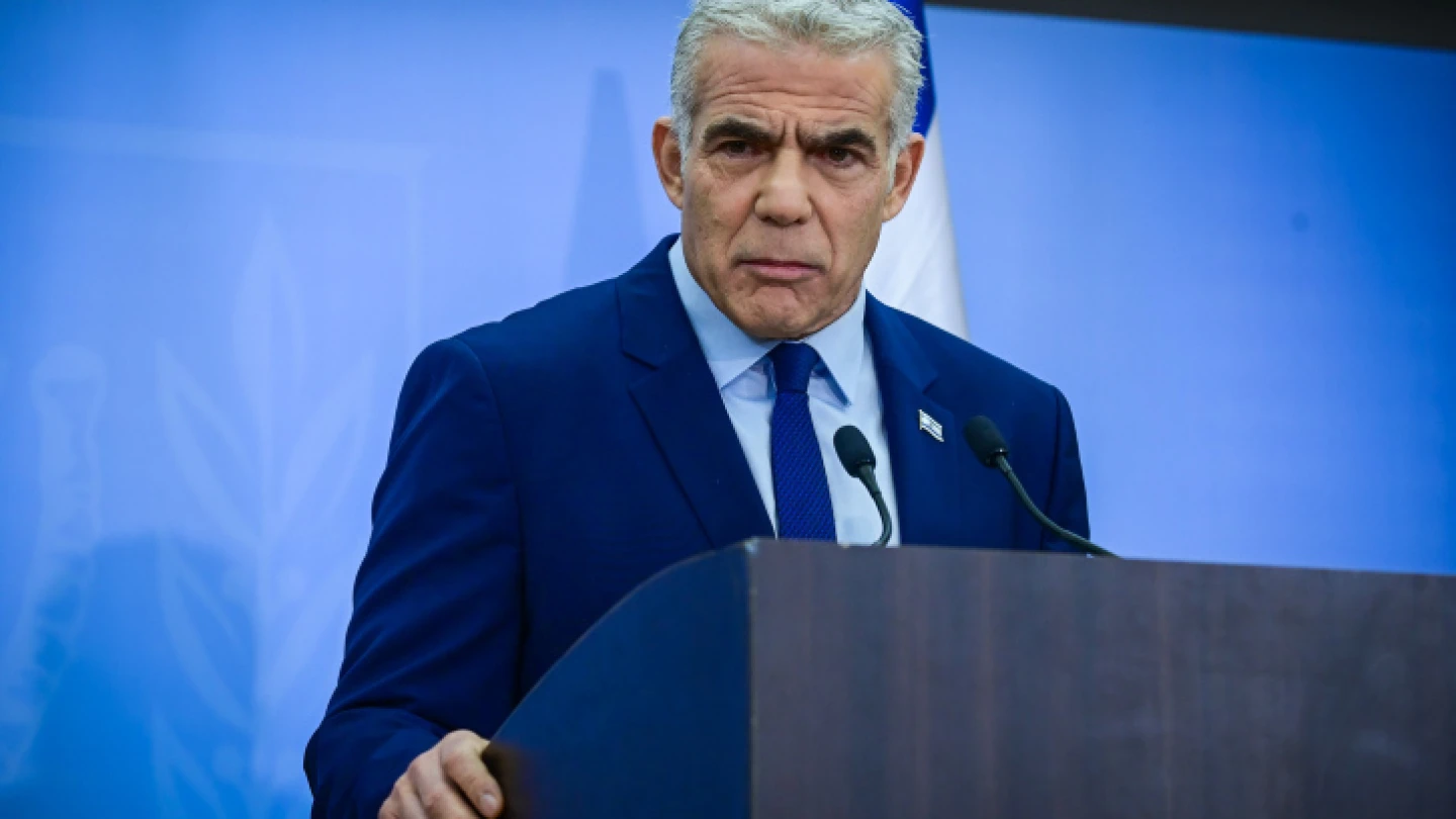 Outgoing Israeli caretaker Prime Minister Yair Lapid holds a press conference in Tel Aviv, Dec. 22, 2022. Photo by Tomer Neuberg/Flash90.