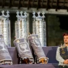An Israeli soldier holds the Torah Scroll carried by IDF Chief Rabbi Shlomo Goren in the Six-Day War, during a ceremony at the Western Wall in Jerusalem, in memory of the soldiers killed in "Operation Protective Edge" and in Israel's other wars. Aug.12, 2015. Photo by Yonatan Sindel/Flash90.