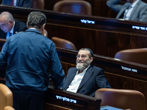 Defense Minister Israel Katz speaks with United Torah Judaism Knesset member Moshe Gafni during a vote on the proposal to dissolve parliament, June 12, 2025. Photo by Chaim Goldberg/Flash90.