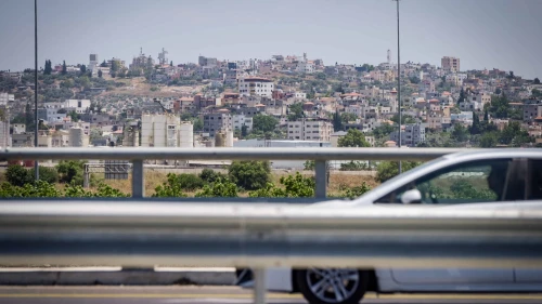 The Israeli town of Bat Hefer backdropped by the Palestinian city of Tulkarem, situated on the western edge of northern Samaria, May 29, 2024. Photo by Avshalom Sassoni/Flash90.