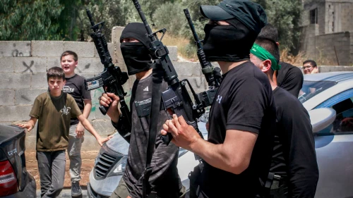 Armed Palestinians attend the funeral of terrorists killed during an Israeli military operation in Kafr Dan, west of Jenin, June 12, 2024. Photo by Nasser Ishtayeh/Flash90.