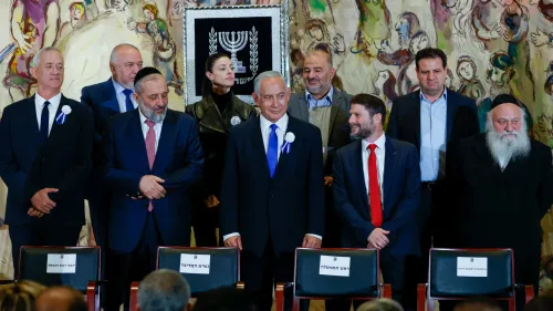 Likud leader Benjamin Netanyahu with Shas Chairman Aryeh Deri, Religious Zionism Party head Bezalel Smotrich and other party leaders at the swearing-in of the 25th Knesset in Jerusalem, Nov. 15, 2022. Photo: Olivier Fitoussi/Flash90.