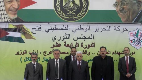 Palestinian leader Mahmoud Abbas (center) delivers a statement at a conference in Ramallah on Oct. 18, 2014. Photo by Flash90.
