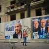 Election campaign posters in Tel Aviv depict Israeli Prime Minister Benjamin Netanyahu, head of the Likud Party, as well as the leaders of the Blue and White Party, including Benny Gantz, second from left, Sept. 2019. Photo by Adam Shuldman/Flash90.