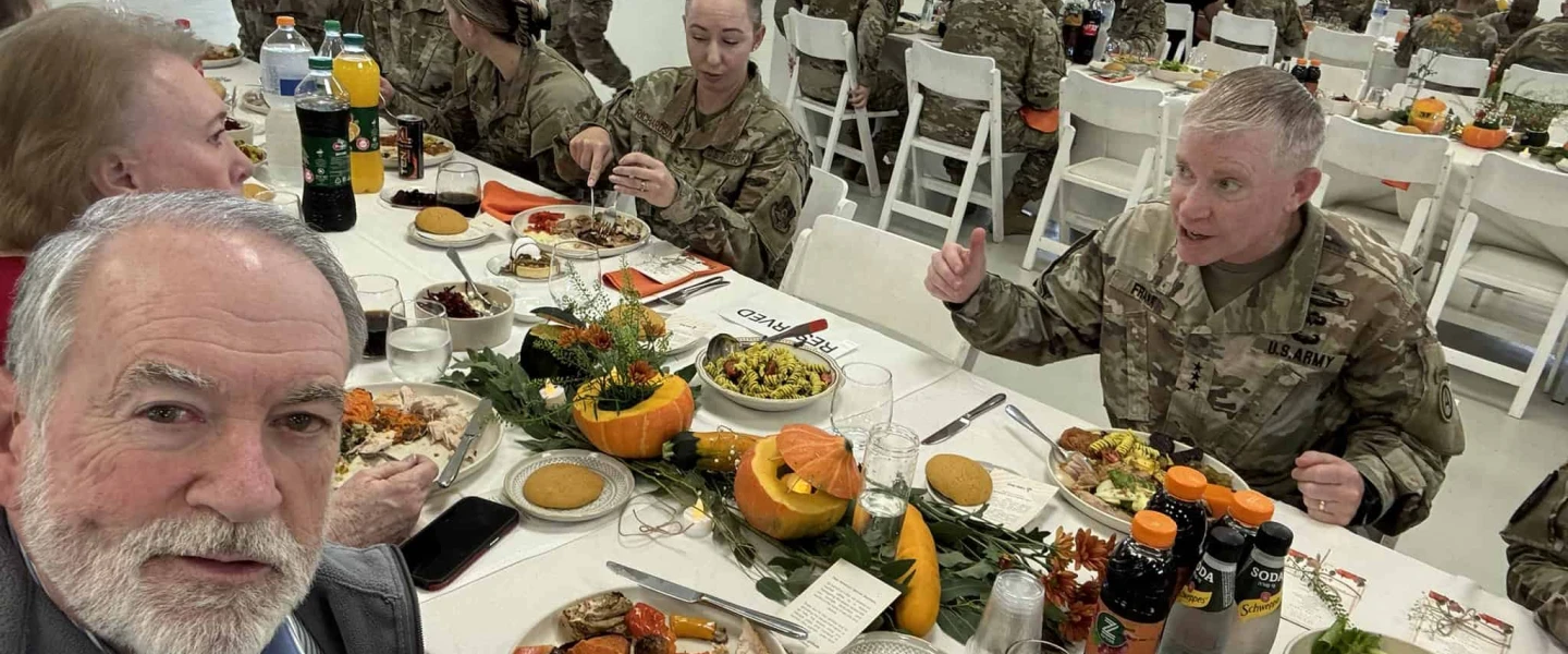 U.S. Ambassador to Israel Mike Huckabee and his wife, Janet, celebrate Thanksgiving together with American service members stationed in Kiryat Gat, Israel, on Nov. 27, 2025. Credit: The U.S. Embassy Jerusalem.