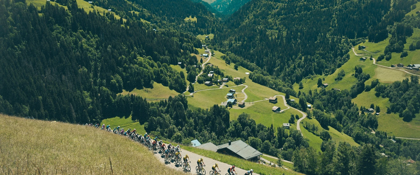 (EDITOR'S NOTE: This Image has been digitally enhanced) A general view of the peloton compete climbing to the Col du Pre (1700m) during the 78th Tour Auvergne-Rhone-Alpes 2026, Stage 8 a 120.1km stage from Beaufort to Plateau de Solaison - Brison 1497m / #UCIWT, June 14, 2026, in Brison, France. Photo by Dario Belingheri/Getty Images.