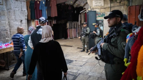 Israeli border police stand guard as Muslims make their way to the Temple Mount for the first Friday prayers of Ramadan, March 24, 2023. Photo by Yonatan Sindel/Flash90.