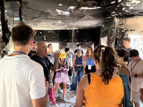 U.S. students visit Be'eri, Israel on Aug. 8, 2025. Courtesy of Hasbara Fellowships and IsraelAmbassadors.com.