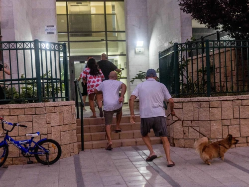 Israelis run for shelter during a rocket alert in Ashkelon, Aug. 6, 2022. Photo by Yonatan Sindel/Flash90.