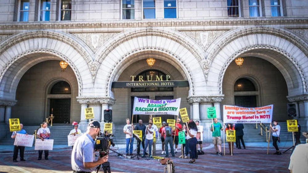 A protest against then-presidential candidate Donald Trump outside the Trump International Hotel in Washington, DC, Sept. 12, 2016. Credit: Ted Eytan via Wikimedia Commons.
