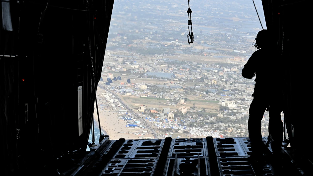 A U.S. Air Force C-130J Super Hercules conducts an airdrop of humanitarian assistance over Gaza, Mar. 2, 2024. Credit: U.S. Air Force.