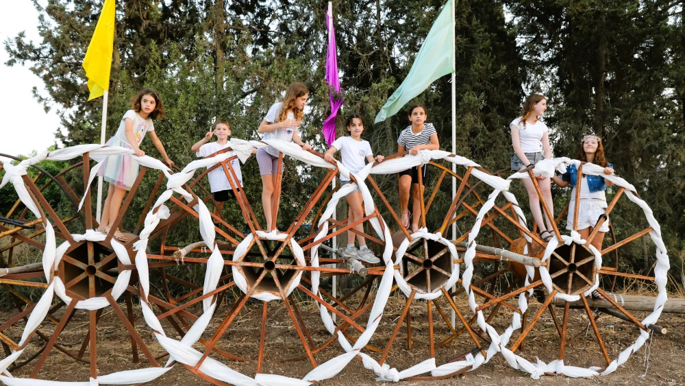 Children at a celebration for the Jewish holiday of Shavuot in Kibbutz Sarid in northern Israel, June 1, 2025. Photo by Anat Hermony/Flash90.